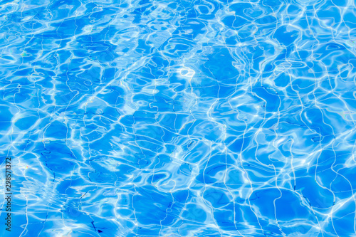 Surface of blue water wave in swimming pool  Pool water background.