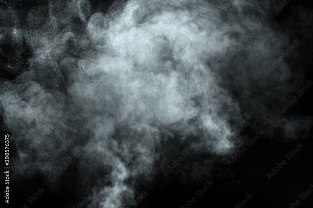 Abstract  powder or smoke isolated on black background