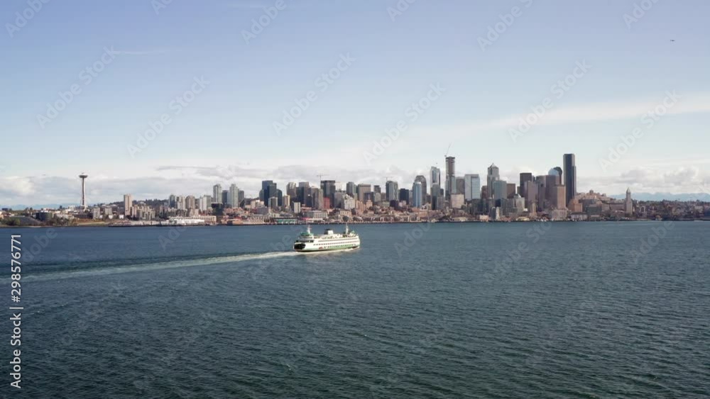 Right to Left Truck Shot of Downtown Seattle on a Sunny Day with Ferry in Foreground Right to Left Truck Shot of Downtown Seattle on a Sunny Day with Ferry in Foreground