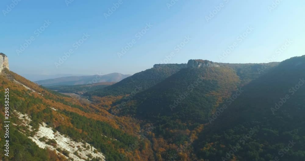 Drone flight over autumn forest in Tuscany, Italy. Autumn leaves and trees. Orange, Red, Yellow and Green beautiful scene. Drone flight over autumn forest in Tuscany, Italy. Autumn leaves and trees. Orange, Red, Yellow and Green beautiful scene.