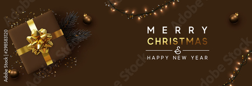 Christmas banner. Background Xmas design of sparkling lights garland, with realistic gifts box, pine branch and glitter gold confetti. Horizontal christmas poster, greeting cards, headers, website