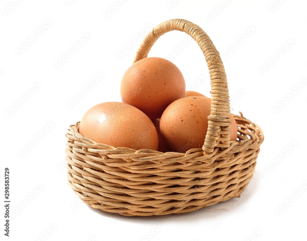 fresh brown eggs in the wooden basket on isolate white background fresh brown eggs in the wooden basket on isolate white background