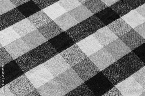 Black and white checkered plaid fabric texture for background. tartan texture