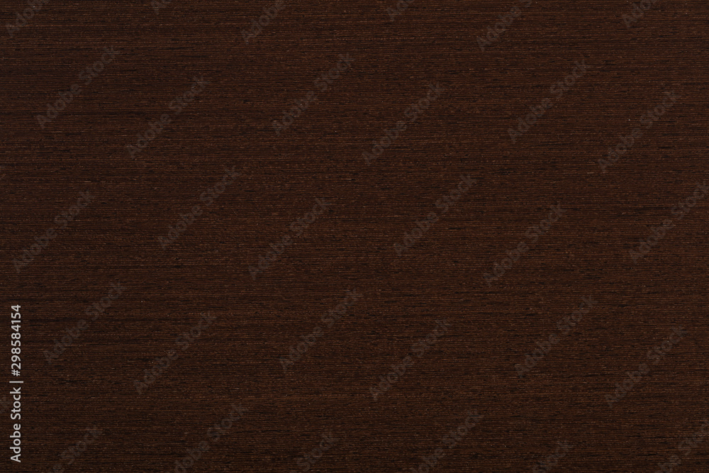 Fototapeta premium New beautiful veneer background in attractive chocolate color. High quality wood texture.