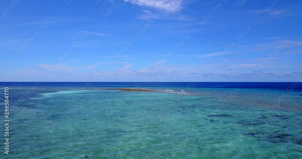 Rocky Island off the coast of Greece - surrounded by gorgeous blue water - isolated ( 4K Wide Shot) Rocky Island off the coast of Greece - surrounded by gorgeous blue water - isolated ( 4K Wide Shot)