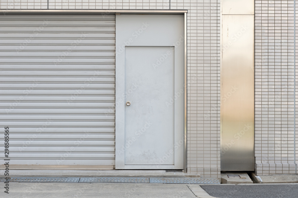 Fototapeta premium sidewalk by street wall & door