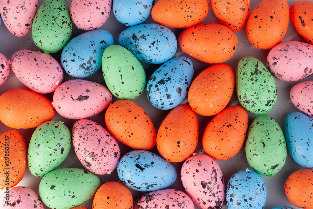 Many colored easter eggs. Preparing and celebrating Easter. Colored background, texture Many colored easter eggs. Preparing and celebrating Easter. Colored background, texture