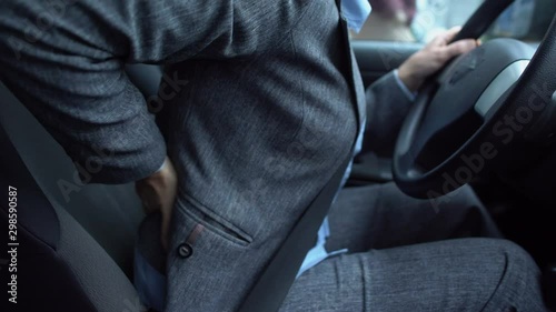 Lady massaging her numb lower back, problems with spine, sedentary lifestyle