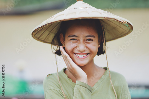 Fototapeta Portrait of Asian Beautiful Burmese girl farmer in Myanmar