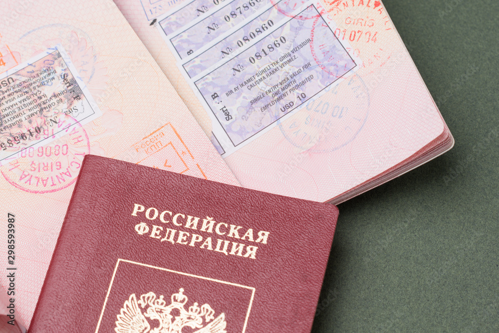 Perm, Russia-July 30, 2019: Russian passports with visa stamps, close-up Perm, Russia-July 30, 2019: Russian passports with visa stamps, close-up