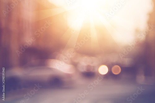 Blur traffic road with colorful bokeh light abstract background.