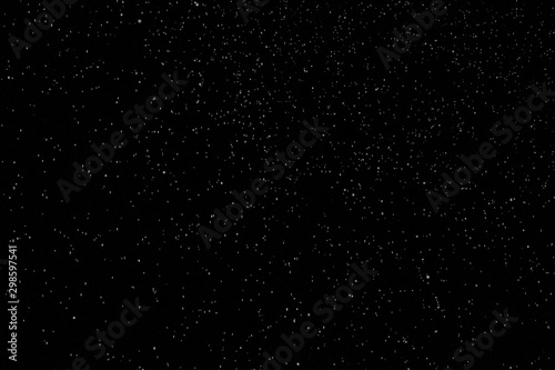 Beautiful snowfall isolated on the black background. Seamless loop animation. Use the composite mode Screen  Add or Lighten for transparency.