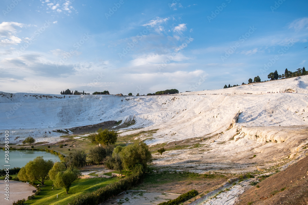Pamukkale termal waters with the white rocks. Pamukkale meaning cotton castle is beautiful landscape in Denizli, Turkey.