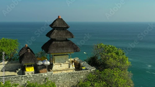 Bali, Indonesia, aerial view of Pura Luhur Uluwatu temple at sunrise. photo