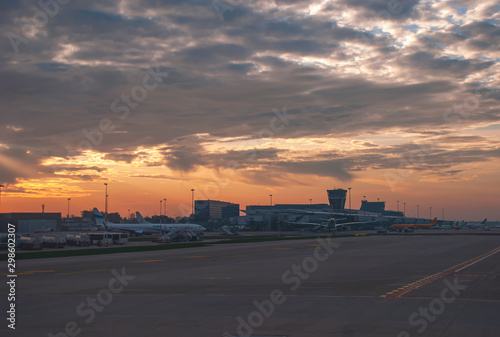 The sun rises over Warsaw Airport in Poland