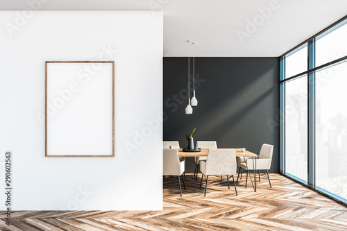 Gray and white dining room with poster photo