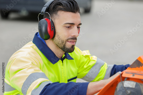 a man with ear protection photo