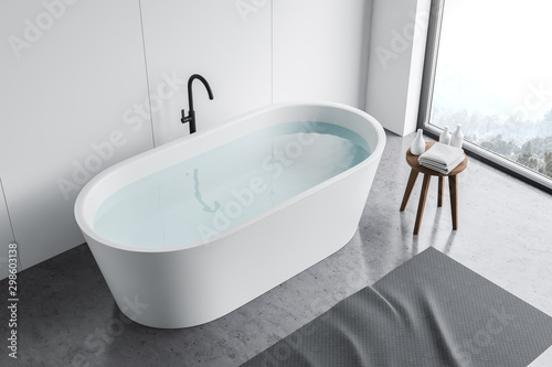 Top view of bathtub in white panel bathroom Fototapet