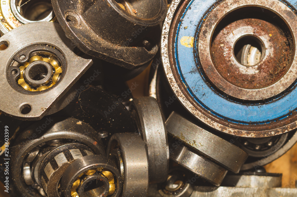 Metal bearings. pile of gears. metal scrap Metal bearings. pile of gears. metal scrap