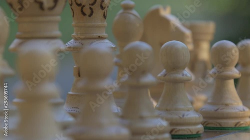 Full chess board. Close up of figurines on Chessboard outside
