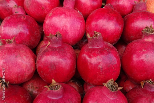 Pomegranate closeup, background. Group of pomegranates