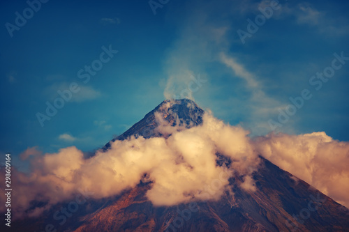Mayon Active Volcano on Luzon Island Philippines. Beautiful View on Greatest Mountain Surrounded by Clouds and Blue Sky. Panoramic Photo on Wonderful Famous National Tourist Landscape