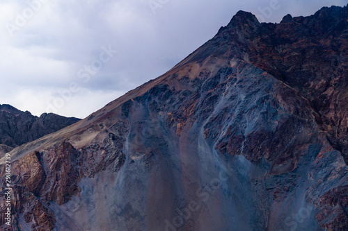 Texture of a mountain peak, near Sand Dunes at Nubra Valley, Diskit, Ladakh district, Jammu and Kashmir, India photo