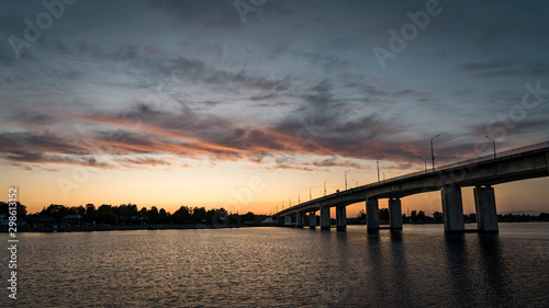 Kostroma. Gold ring of Russia. Bridge over the Volga river. Clouds in the evening sky. © ValerAnDim