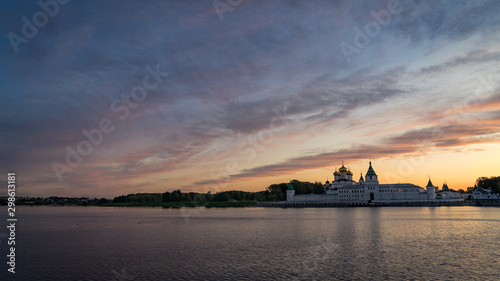 Kostroma. Gold ring of Russia. The monastery of St. Ipaty. Clouds in the evening sky and the Volga river. © ValerAnDim