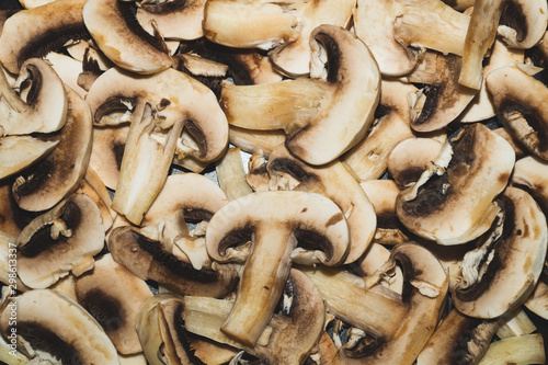 Sliced mushrooms. background with champignons. healthy food. vegetarian nutrition