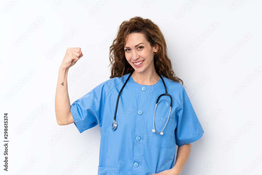 Young pretty woman over isolated background with doctor gown and making strong gesture Young pretty woman over isolated background with doctor gown and making strong gesture
