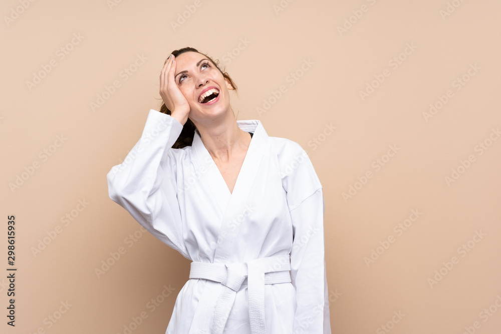 Young woman doing karate has realized something and intending the solution Young woman doing karate has realized something and intending the solution
