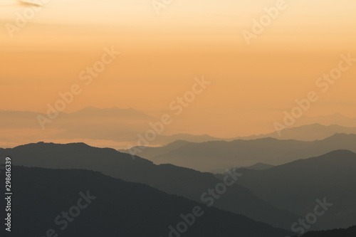 mountain range in nepal during sunset