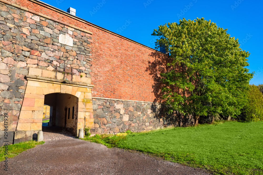 Finland. Helsinki. Fortress Suomenlinna. Sveaborg. Europe. Gates in the walls of the fortress. Sightseeing tours in Sveaborg fort. Military monument. Fortifications of the fort. Scandinavian country.