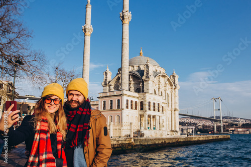 Photography Young european woman takes a selfie portrait in Istanbul, Turkey