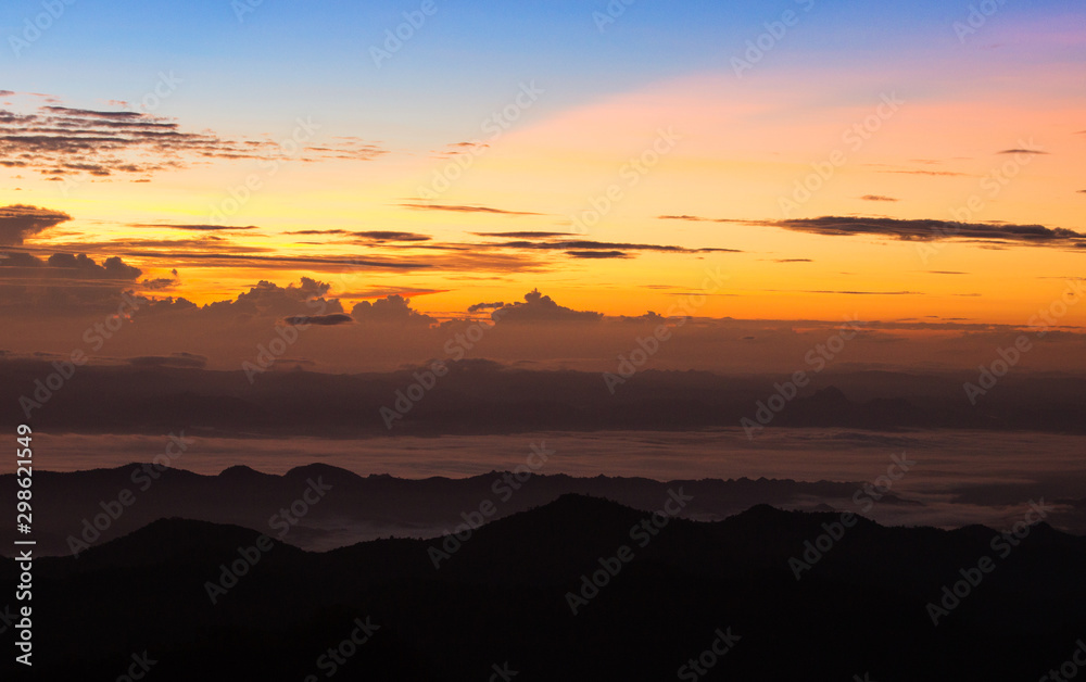 Layer of mountains view during sunrise at Khun Chae National Park, Wiang Pa Pao District, Chiang Rai, Thailand
