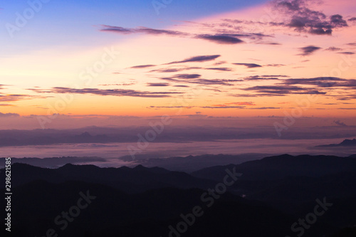 Layer of mountains view during sunrise at Khun Chae National Park, Wiang Pa Pao District, Chiang Rai, Thailand © ting_149