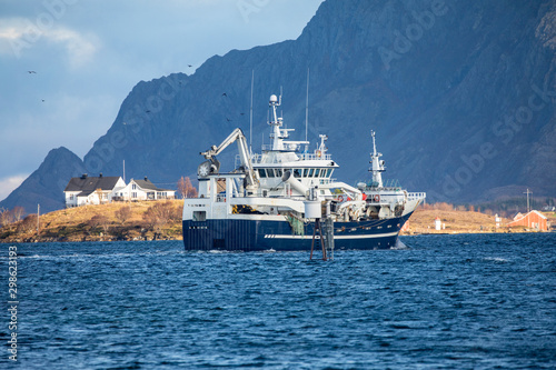 Fishing boat through Brønnøysundet to the fishing fields in northern Norway