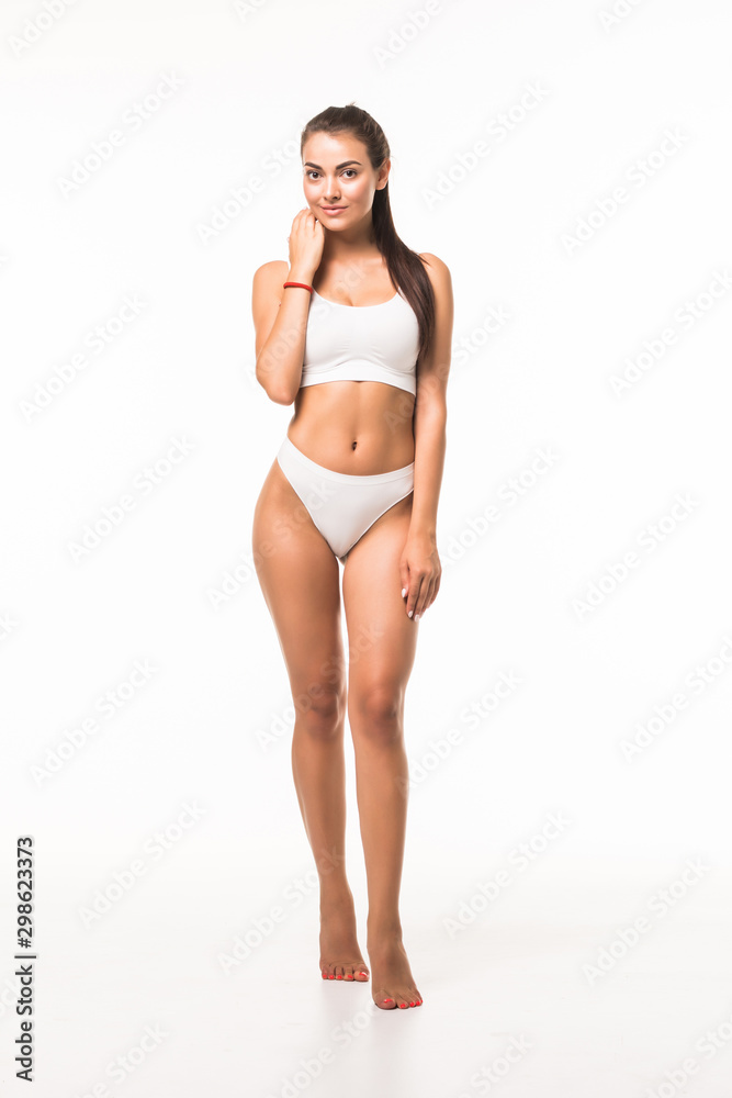 Obraz premium Portrait of happy beautiful fit woman isolated on white background