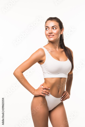 Young pretty woman wearing lingerie isolated on white background © F8  \ Suport Ukraine