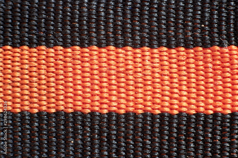 Fototapeta premium Photo texture of fabric on clothes close-up, macro shooting.