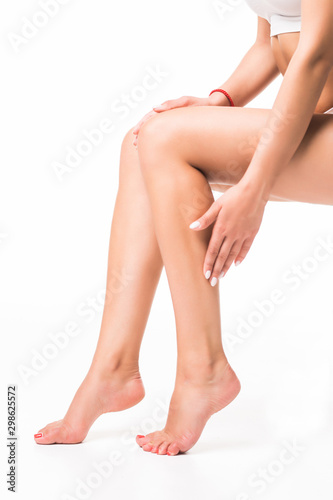 Long pretty woman legs, isolated on white background © F8  \ Suport Ukraine