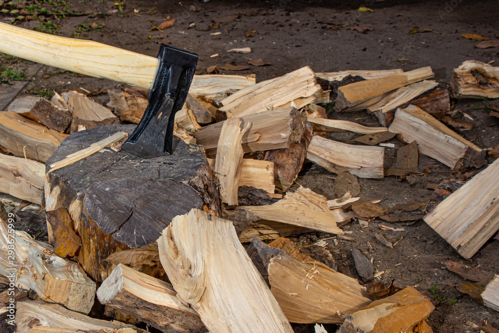 Ax cleaver with chopped wood. Ax cleaver with chopped wood.