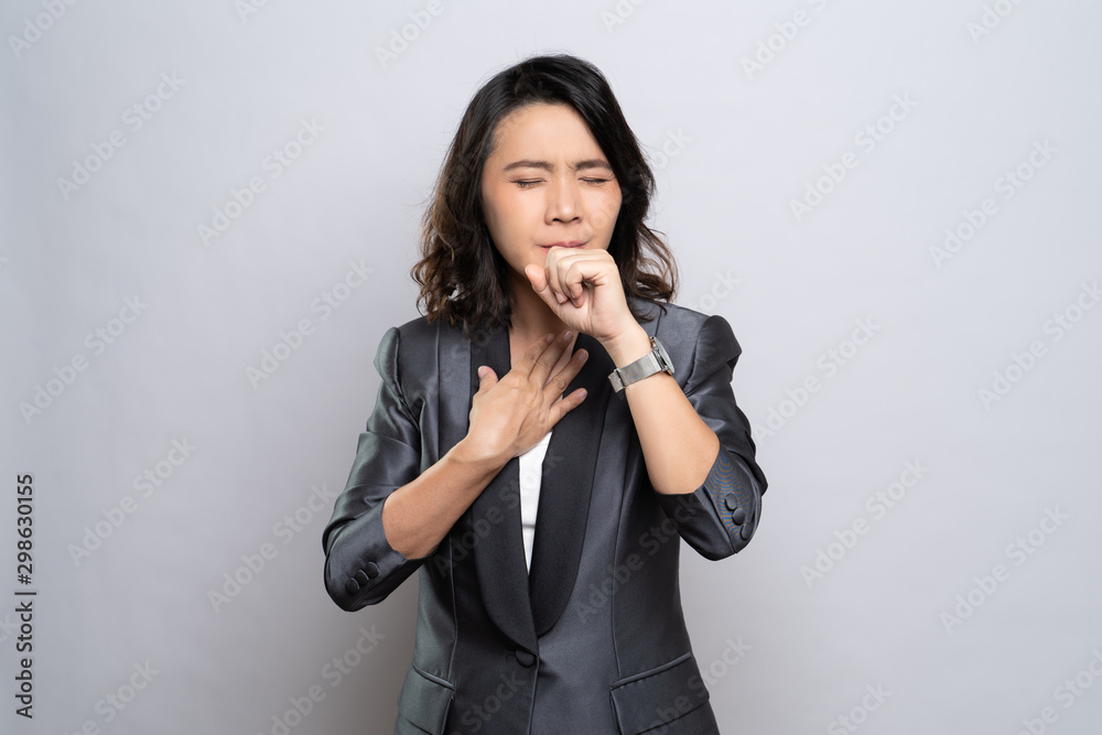 Businesswoman was sick with fever isolated over white background Businesswoman was sick with fever isolated over white background