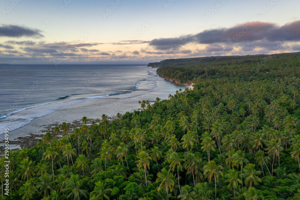 Tropical sunset over Eua island in Kingdom of Tonga aerial photography