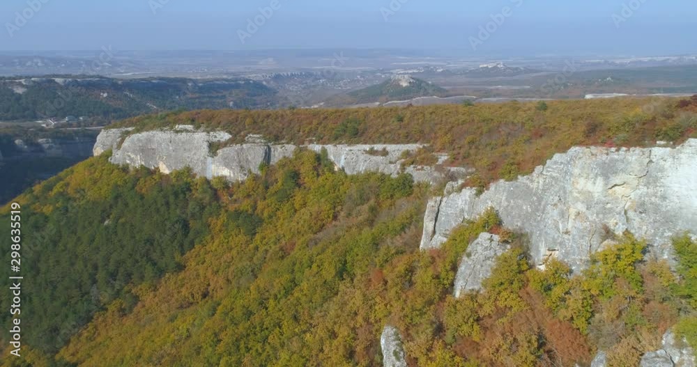 Drone flight over autumn forest in Tuscany, Italy. Autumn leaves and trees. Orange, Red, Yellow and Green beautiful scene. Drone flight over autumn forest in Tuscany, Italy. Autumn leaves and trees. Orange, Red, Yellow and Green beautiful scene.