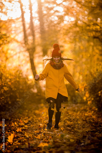 girl walks in the autumn park © Maria Moroz