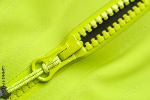 Close-up fragment of a green windbreaker