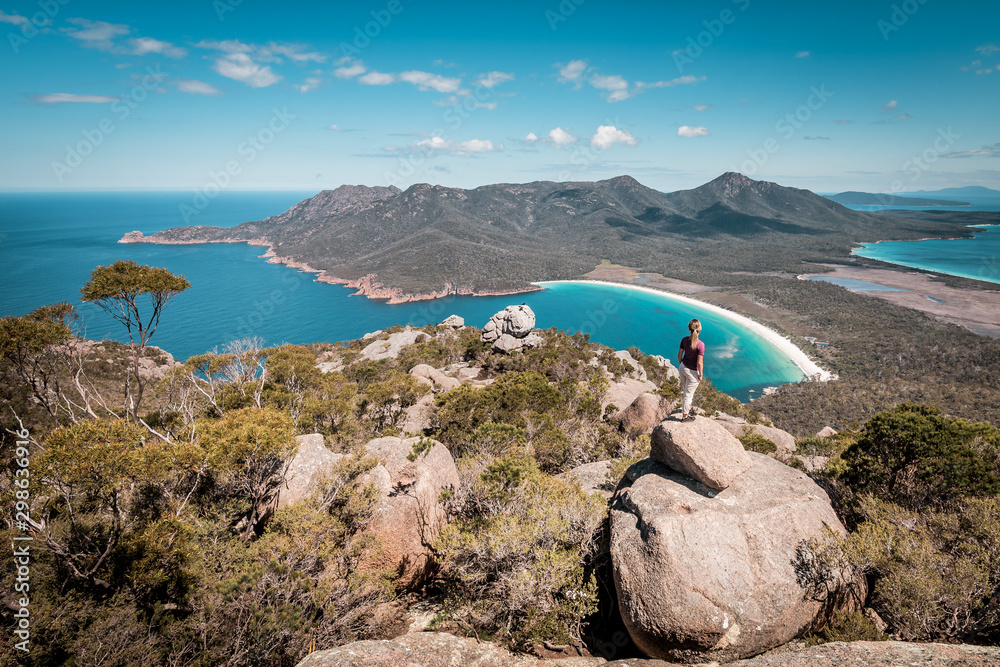 View from Mount Amos to the spectacular Wineglass Bay, white sandy beach and turquoise blue water, Freycinet National Park, Coles Bay, Tasmania, Australia