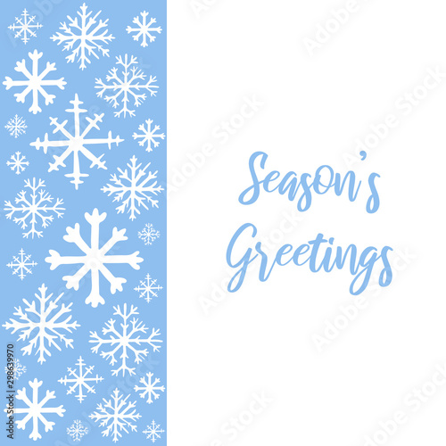 Vector hand drawn background with white snowflakes on blue background and copy space for text. Seasons greetings hand lettered text. Winter, New Year and Christmas template for greeting card, poster